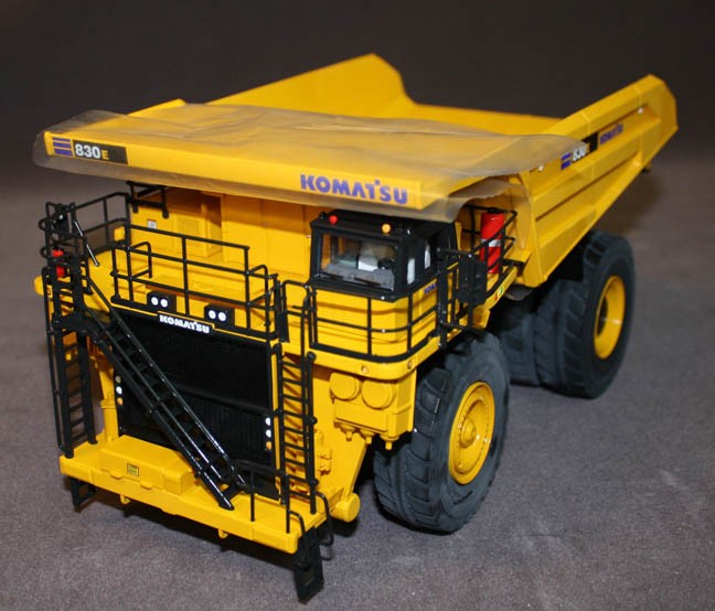 Komatsu 830E AC quarry truck yellow