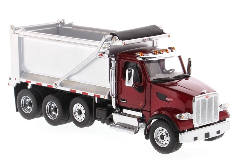 Peterbilt 567 Tandem Truck with Pusher Axle in Metallic Red with Ox Bodies Stampede Dump Bed