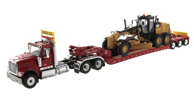 International HX520 Tandem Day Cab Tractor with XL 120 Lowboy Trailer in Red and Cat 12M3 Motor Grader